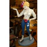 A figure of a rollerskating usherette (tray missing) 88 cm tall, bears name on base 'Popovski 97"