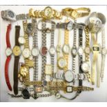 A quantity of gentleman's and ladies quartz wristwatches, to include Timex and Sekonda