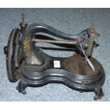 A Jones Serpentine/Catback hand crank sewing machine, circa 1880, serial number 54590