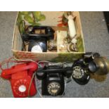 A box of early dial and other telephones.