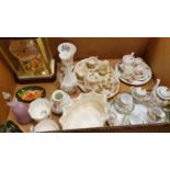 An oval Moorcroft dish, three miniature tea services, four Coalport figurines, Visiting Day, the