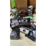 3 boxes of camera's and accessories to include, a Bell & Howell Autoset turret camera, a Keystone 25