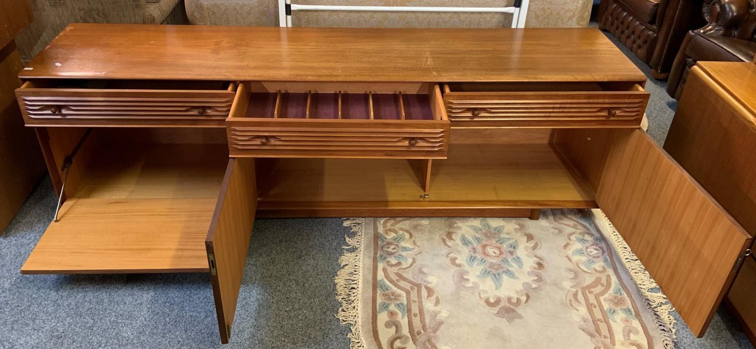 A low teak sideboard from Websters of Brighouse, 198 x 60 cm comprising of 3 drawers over 3 - Image 2 of 3