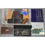 Cased sets of drawing instruments and other items.