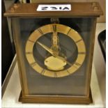 A Kaiser brass cased 7 jewel 8 day carriage clock. With perspex front and back and floating skeleton