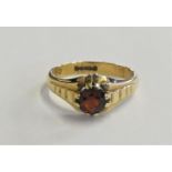 A 9ct gold and garnet signet ring, 3.9gms, size R