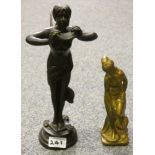 A brass figure of a female nude together with a figure of an angel (2).