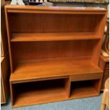 A G-plan teak wall unit, the open shelf top over single drawer and open base.