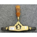 A horses 3 tier plume in brass holder marked E R with leather strap.