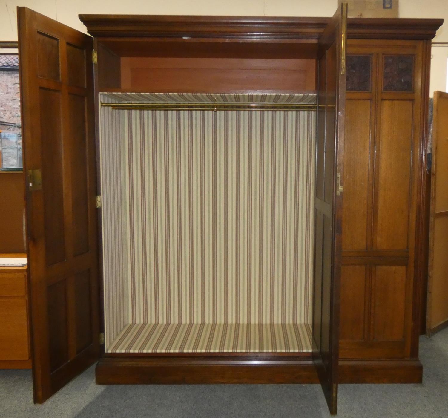 A mahogany triple wardrobe with central mirrored door (pin attachment), the left side 'double' - Image 2 of 2