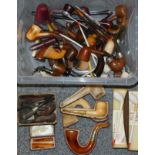 A collection of pipes, to include and Edwardian silver mounted Meerschaum Sherlock Holmes pipe, case