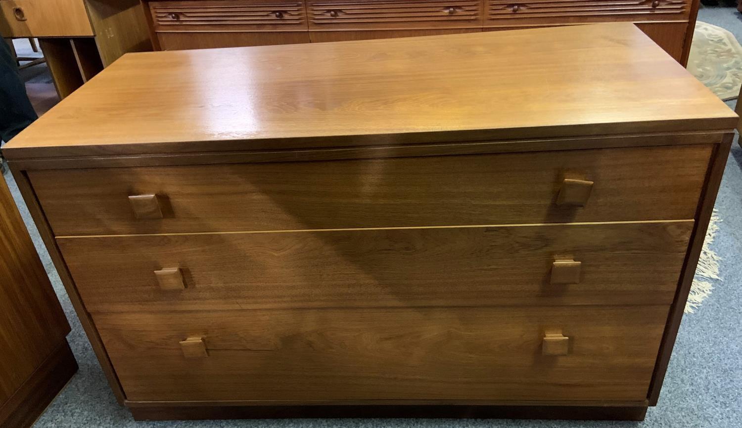 A pair of teak 3 drawer bedside chests together with a matching 3 drawer chest (3).