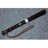 A Victorian wooden truncheon, with gilt 883 number, leather strap, 38 cm.
