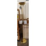 A brass finish uplighter standard lamp with reading lamp.