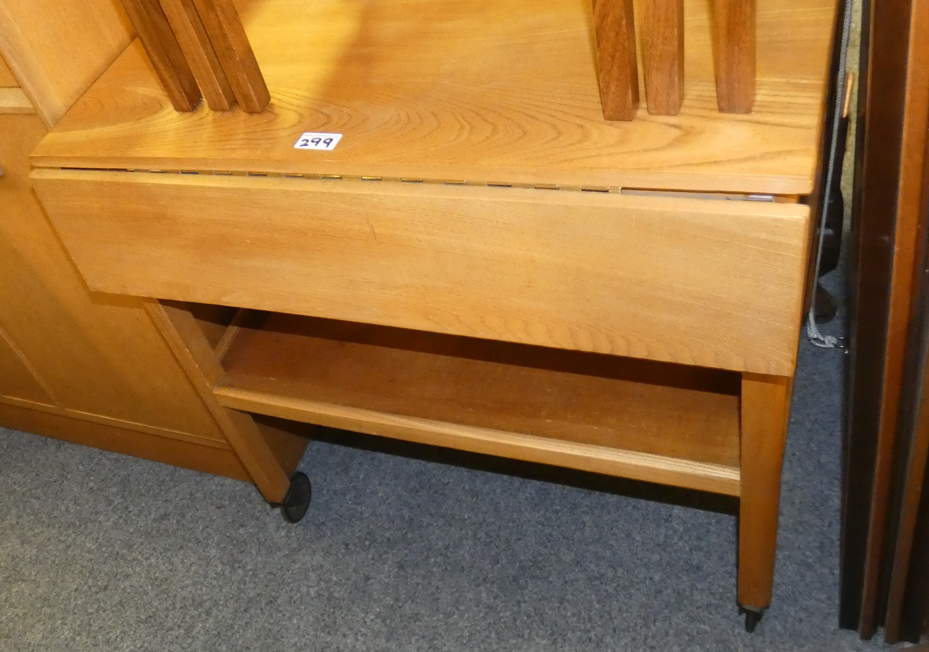 A G-Plan 1960's style light oak tall boy comprising, left side hanging space nest to 3 drawers