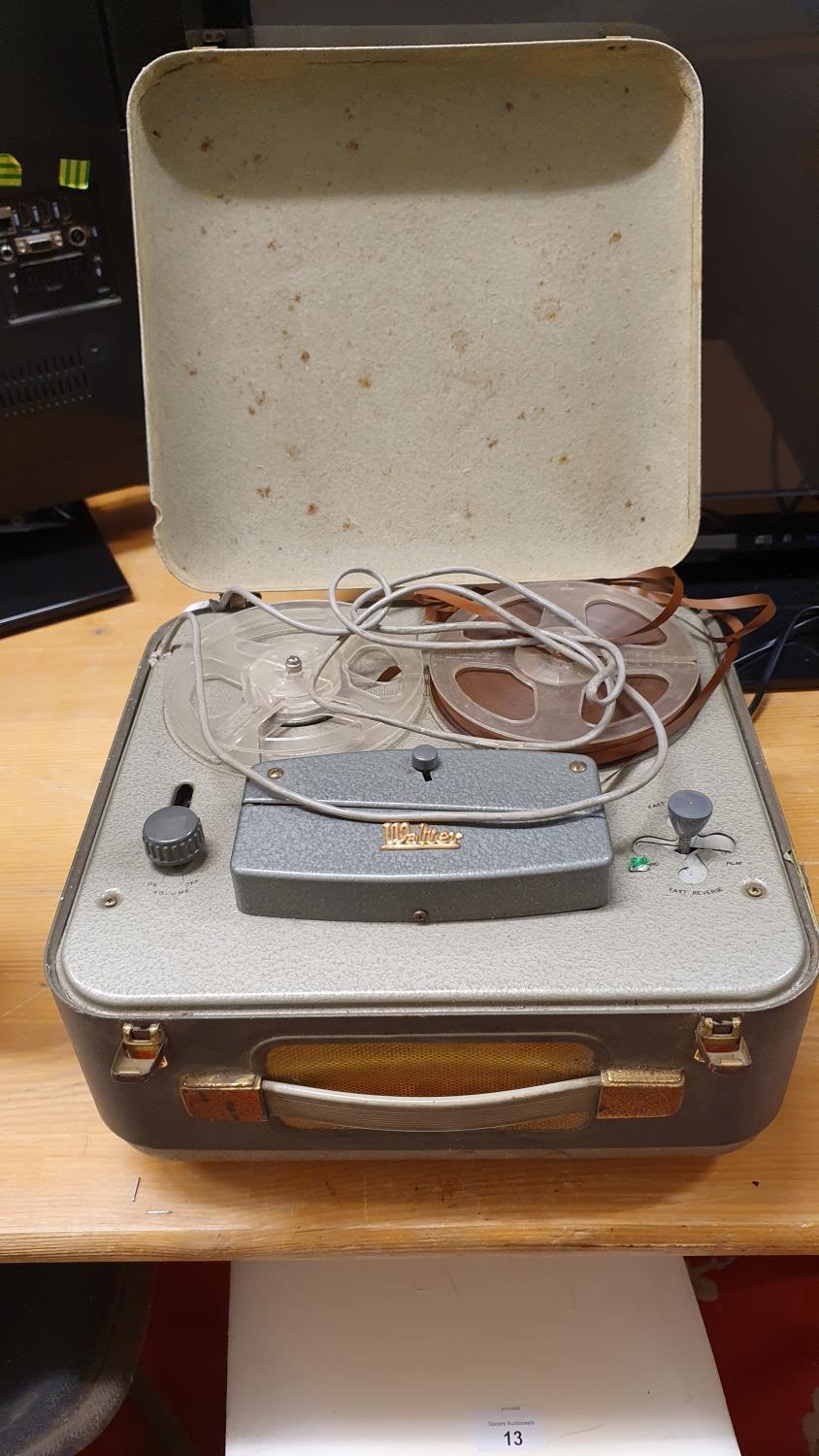 A Walter reel to reel tape player in metal case.