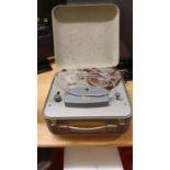 A Walter reel to reel tape player in metal case.