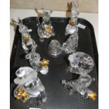 A collection of 8 Lenox Disney glass figurines.