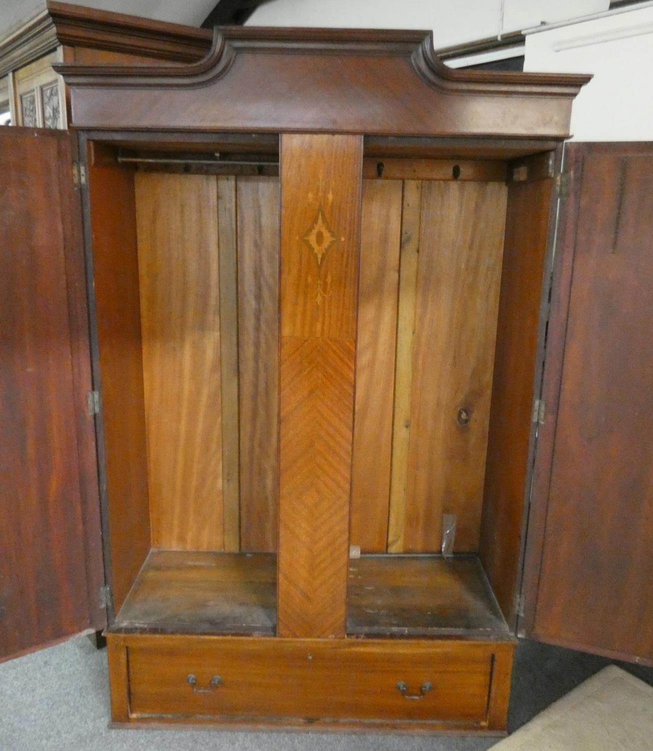 A mahogany double wardrobe with mirrored doors over single base drawer, both sides providing full - Image 2 of 2