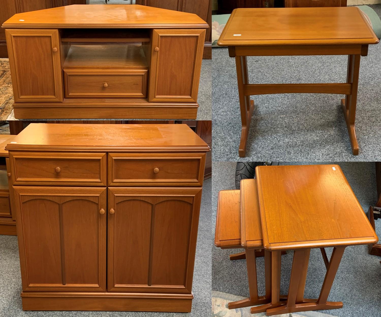 A teak sideboard 85 x 77 cm comprising, twin drawers over cupboards, 2 teak nests of tables and a