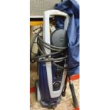 A MacAlister 3 power washer with cover.