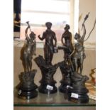 A pair of 19th century spelter figures 'La Paie' and 'La Guerre' together with another pair of a man