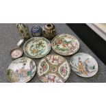 A Chinese Famile Verte plate with stork decoration, four other Chinese plates and other wares.