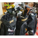 Three golf bags and 20 various clubs.