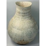 Betty Blandino (b.1927), a large coil built stoneware vessel, of squat form with flared rim, mottled