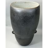 David Lloyd-Jones (1928 - 1994), a twin handled vase with a speckled ebony glaze, mottled cream