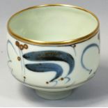 Derek Clarkson (1928 - 2013), a porcelain chawan, of cylindrical form, painted with swirls of blue