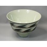 Derek Clarkson (1928 - 2013), an earthenware bowl on conical foot, with glazed foliage brushwork