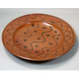 Ray Finch (1914 - 2012), a large wood fired stoneware platter for Winchcombe Pottery, decorated with