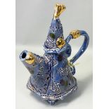 Philomena Pretsell (b.1951), an unusual blue glazed teapot, with painted and incised floral