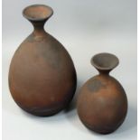 A stoneware vase of pear-shaped form with a flared trumpet neck, by Philip Chan, East Ayton,