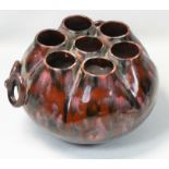 An unusual twin-handled Salopian multi-hole vase, with firing flaw to the handle, height 13cm