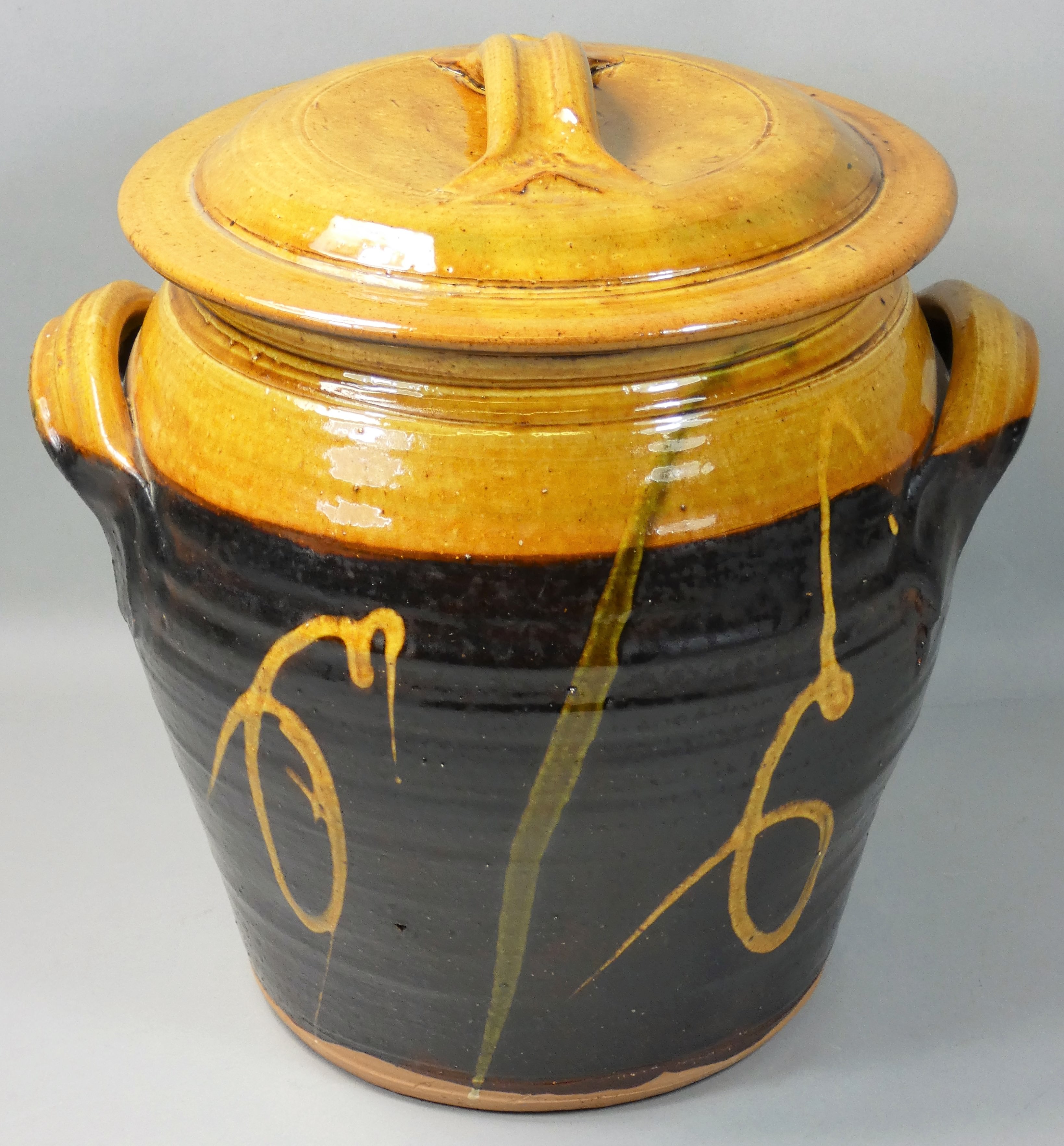 Clive Bowen (b.1943), a large twin handled stoneware lidded container, height 32cm.