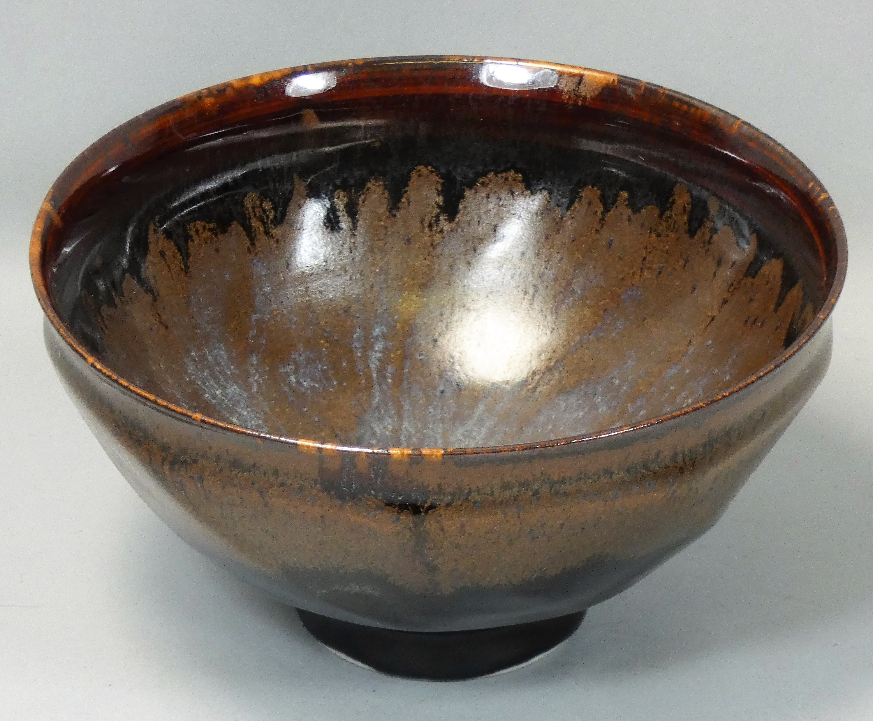 Chris Carter (b.1945), a porcelain brown glazed bowl, with trailing spiral design, no makers mark,