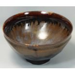 Chris Carter (b.1945), a porcelain brown glazed bowl, with trailing spiral design, no makers mark,