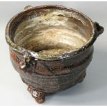 Charles Bound (b.1939), a stoneware bowl raised on trefoil feet, with three stub handles to the rim