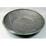 Charles Bound (b.1939), a large stoneware abstract pattern dish, spiral pattern to the centre,