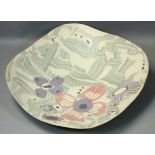 Margery Clinton, a studio pottery stoneware dish of irregular square form, painted with flowers and
