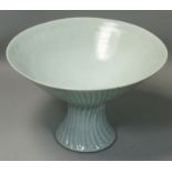 David Leach OBE (1911 - 2005), a porcelain fluted pedestal bowl, pale green celadon glaze