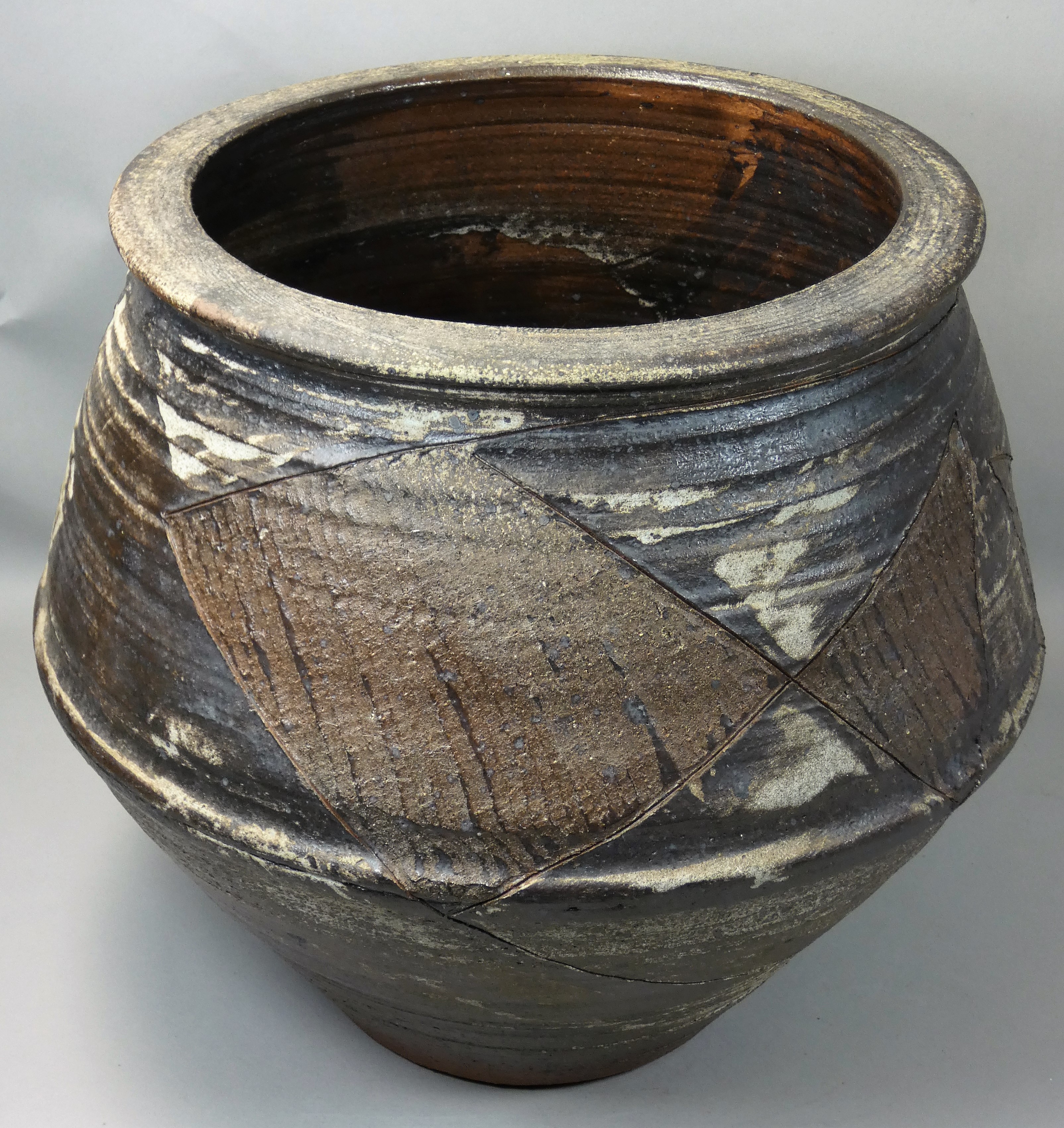 Charles Bound (b.1939), a large stoneware jardinière with abstract decoration, impressed makers