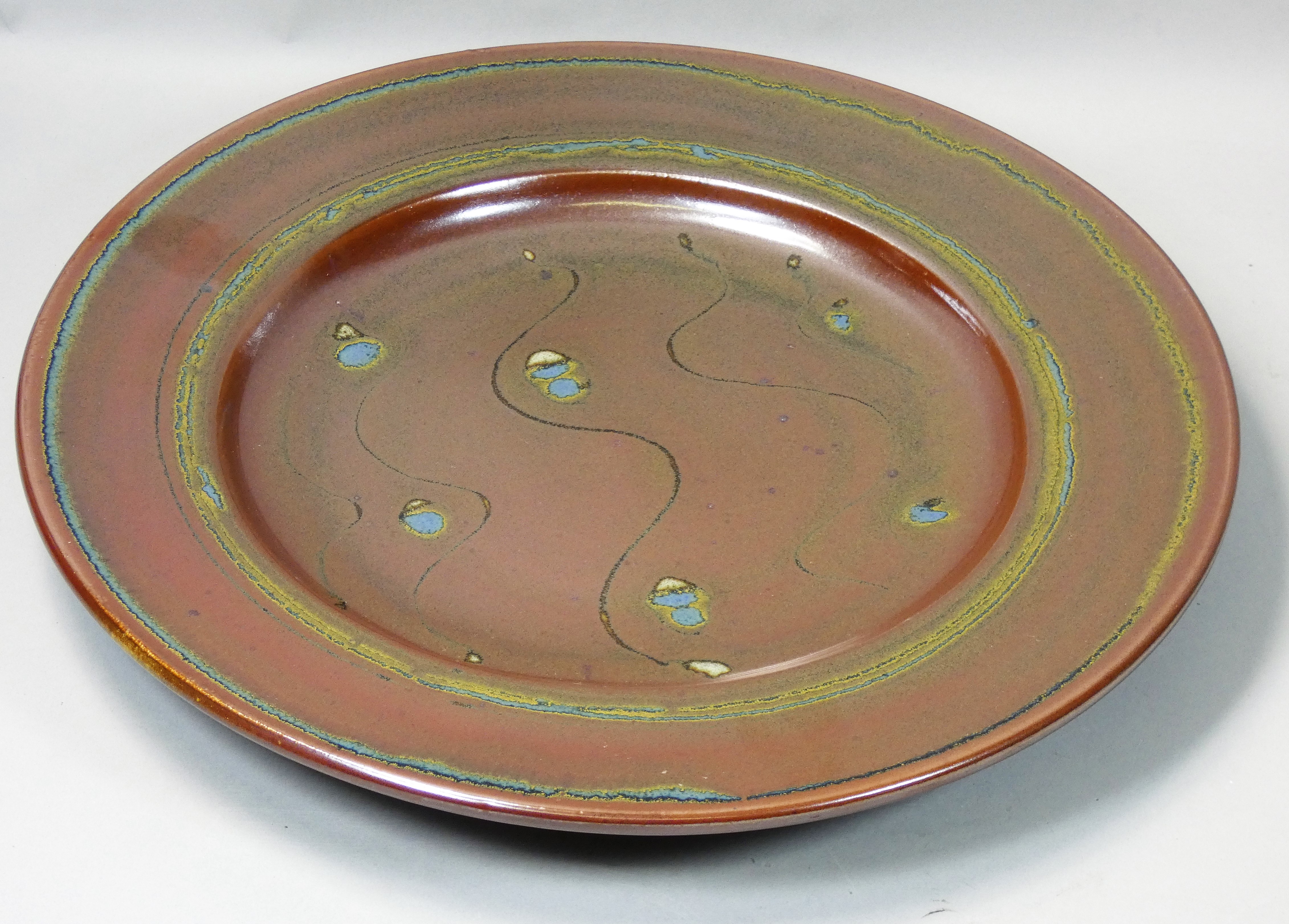 Ray Finch (1914 - 2012), a large wood fired stoneware platter for Winchcombe Pottery, decorated with