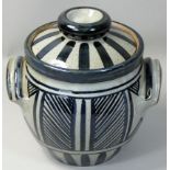 Karen Bunting, a twin-handled stoneware jar and cover, mottled blue/grey glaze, engraved 'K