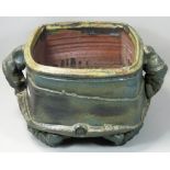 Charles Bound (b.1939), a large irregular square twin handled stoneware container, on four arched