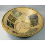 Charles Bound (b.1939), a large stoneware dish with abstract geometric pattern, purchased from the