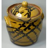 Peter Dick (1936 - 2012), a twin handled lidded jar with abstract decoration, impressed makers mark,