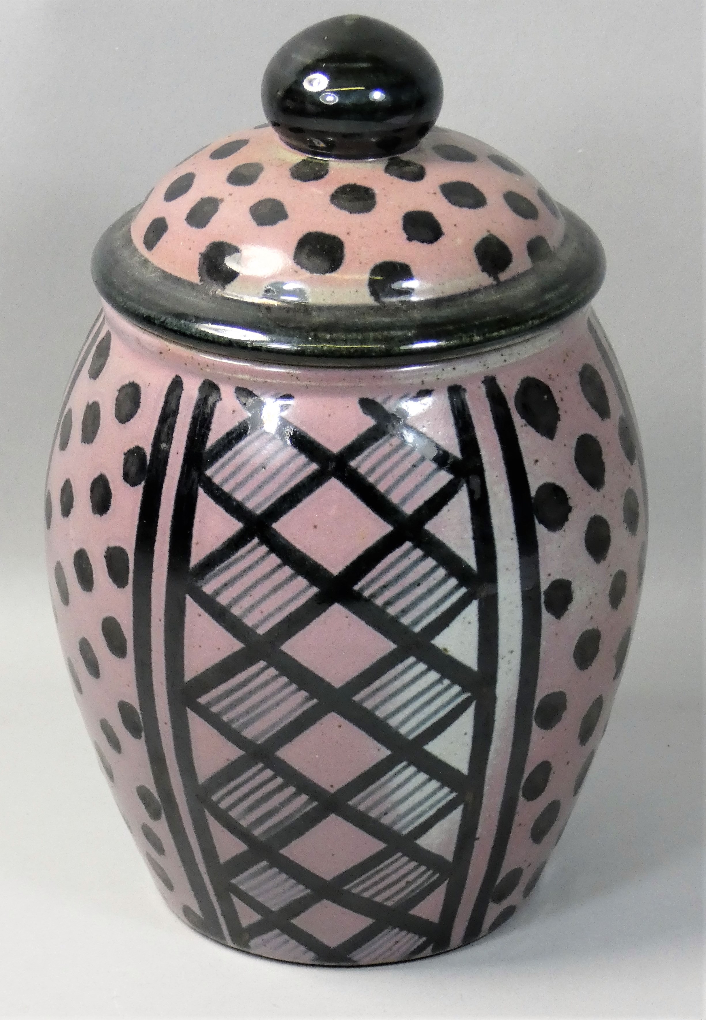 Karen Bunting, a stoneware lidded container, in mottled salmon and grey glaze, engraved 'K Bunting',